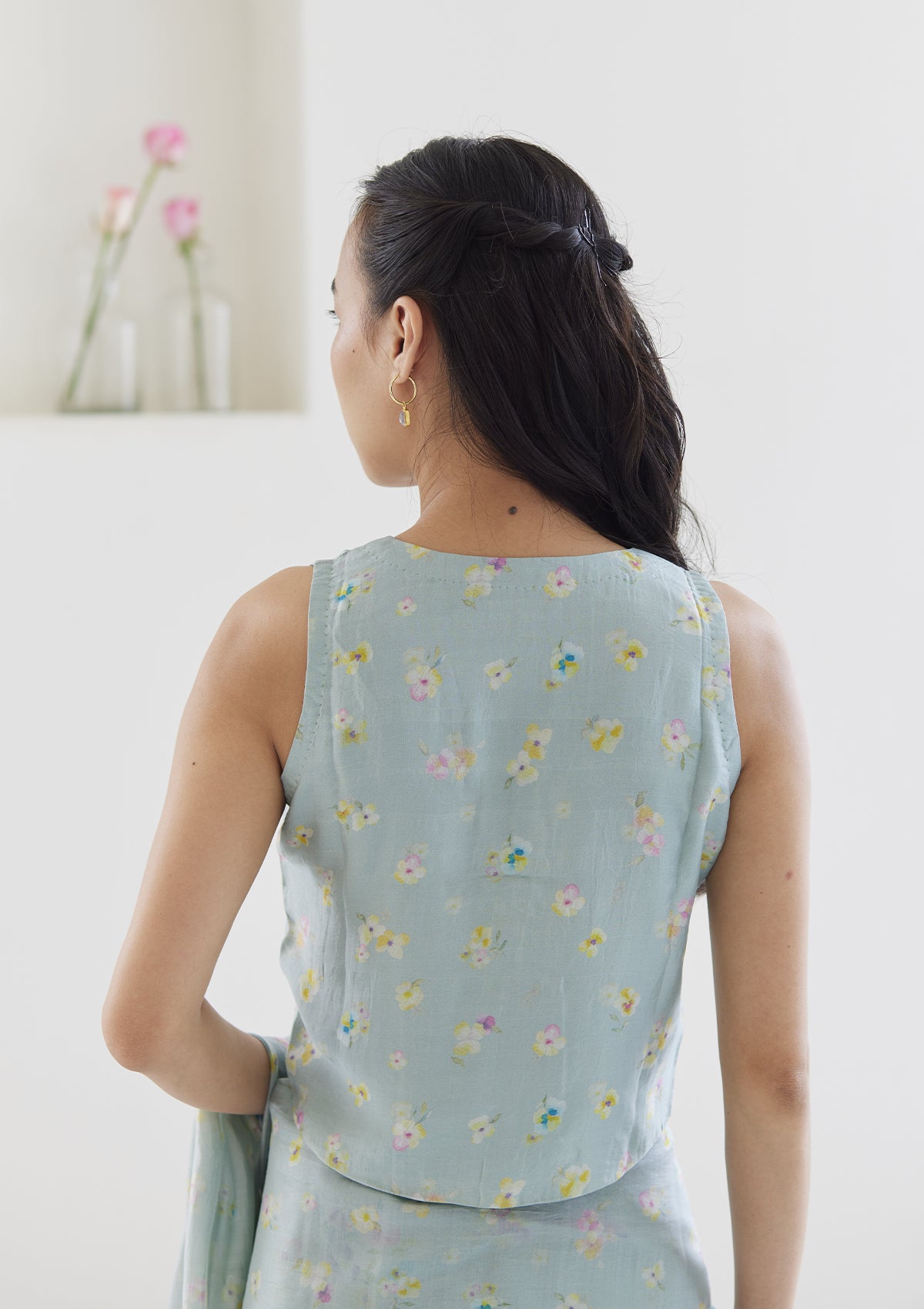 Handwoven designer blouse in seafoam colour, from Surmaye. Floral pansy print.