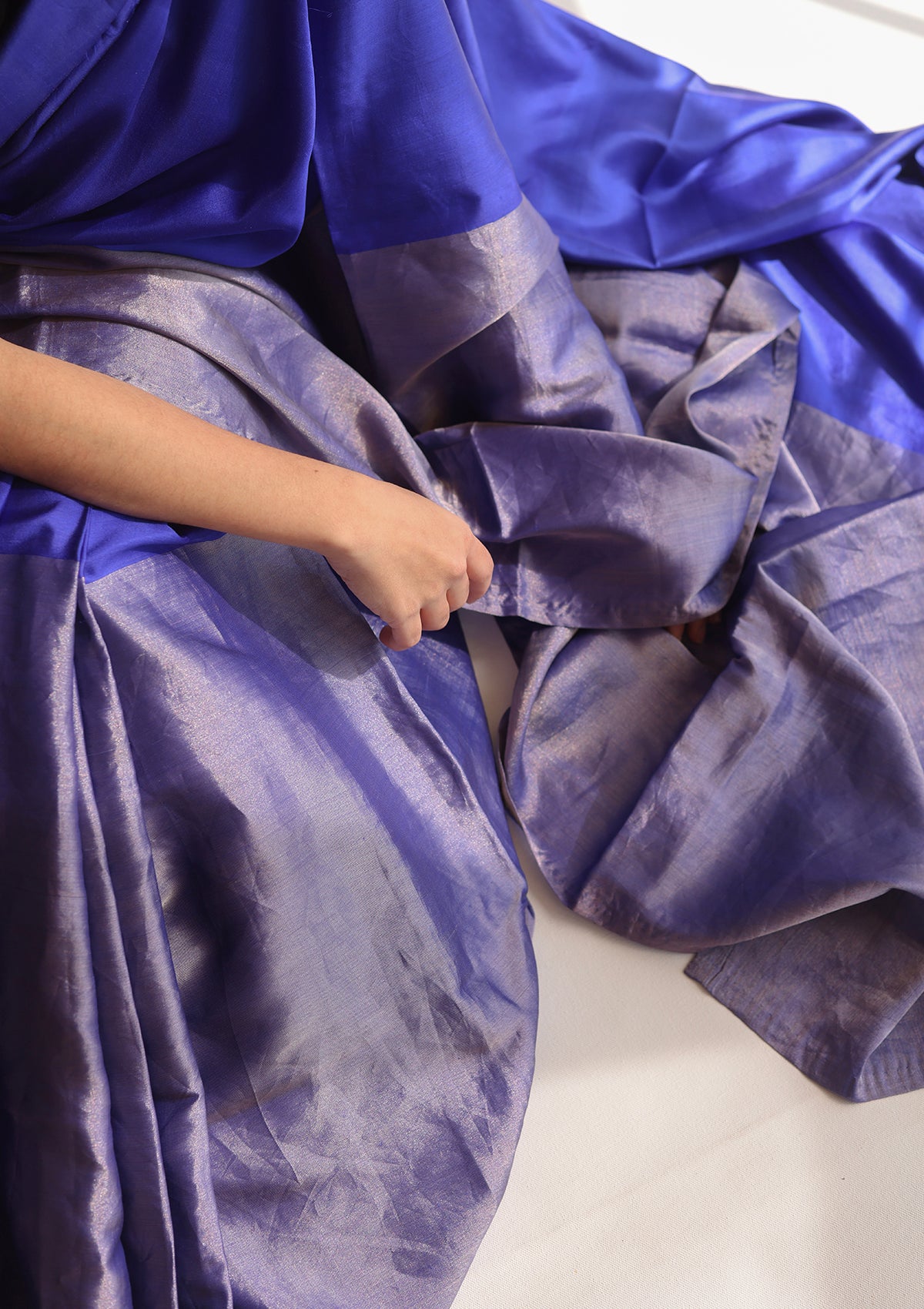 Blue handloom saree from Surmaye, made with mulberry silk satin. Broad zari border at the bottom of the saree. Ideal for festivities.