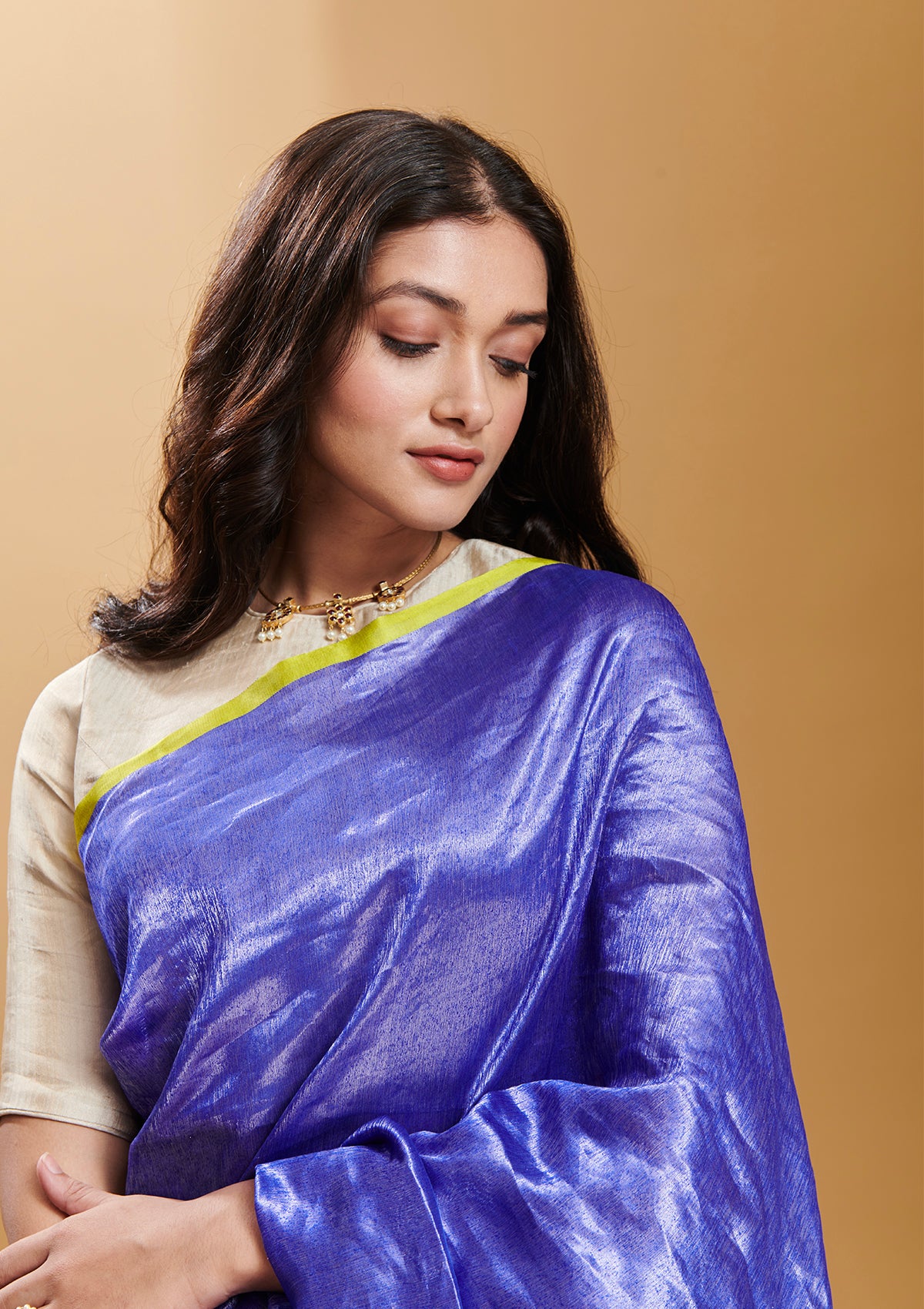 Blue handloom saree from Surmaye, made with handwoven mulberry silk zari. Contrasting yellow satin border.