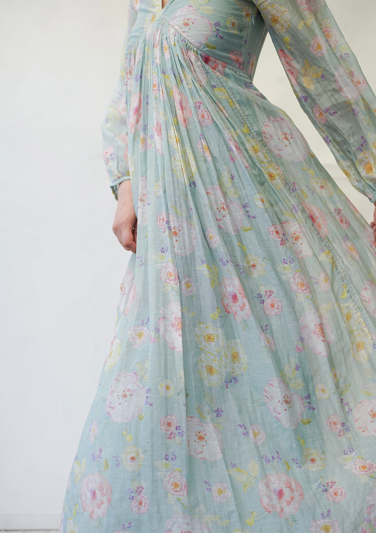 Handwoven maxi dress in sooti chanderi, from Surmaye. Sage green dress with hand-painted floral print.