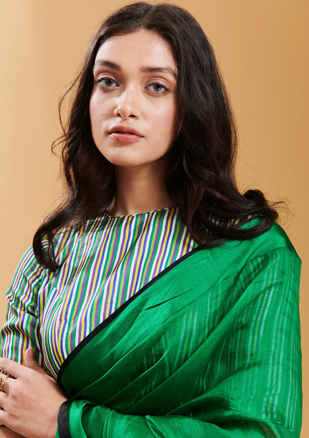Green handloom saree in handwoven organza mulberry silk, from Surmaye. Dual-colour reversible border in green and black.