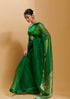 Green handloom silk organza jamdani saree, from Surmaye. Adorned with all-over jamdani weave dots.