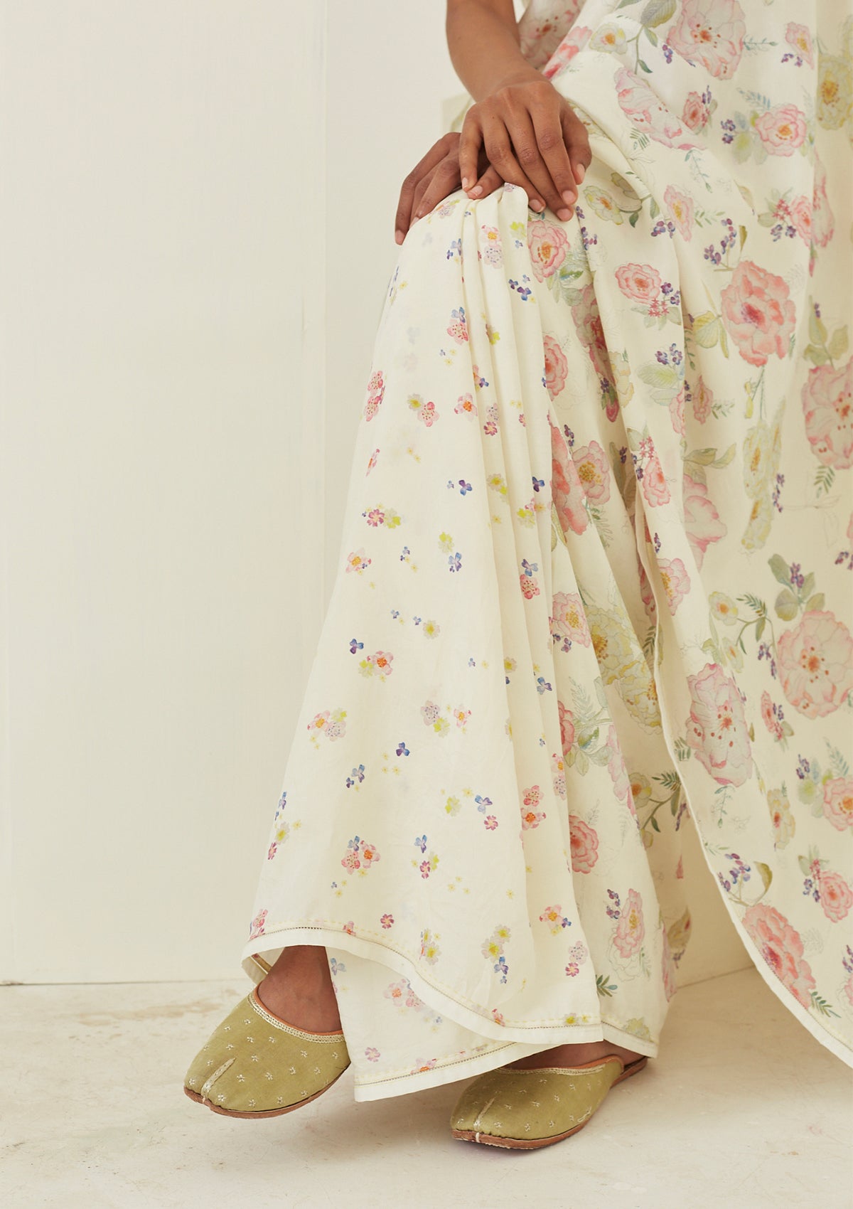 Handloom Ivory Saree from Surmaye. Hand-painted floral print on handwoven mulberry silk.