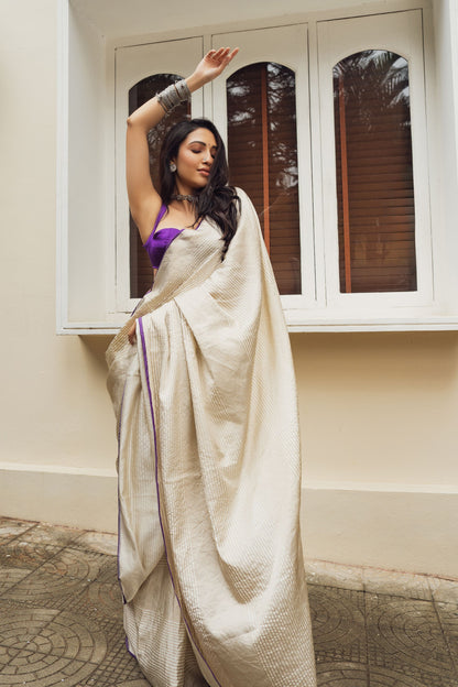 Neha Shetty in Ivory Silken Ripples Saree
