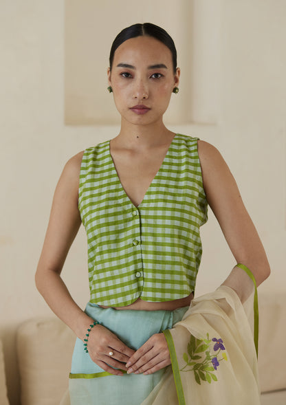 Handwoven designer green blouse in gingham checks, from Surmaye. Paired with Adore silk jamdani saree