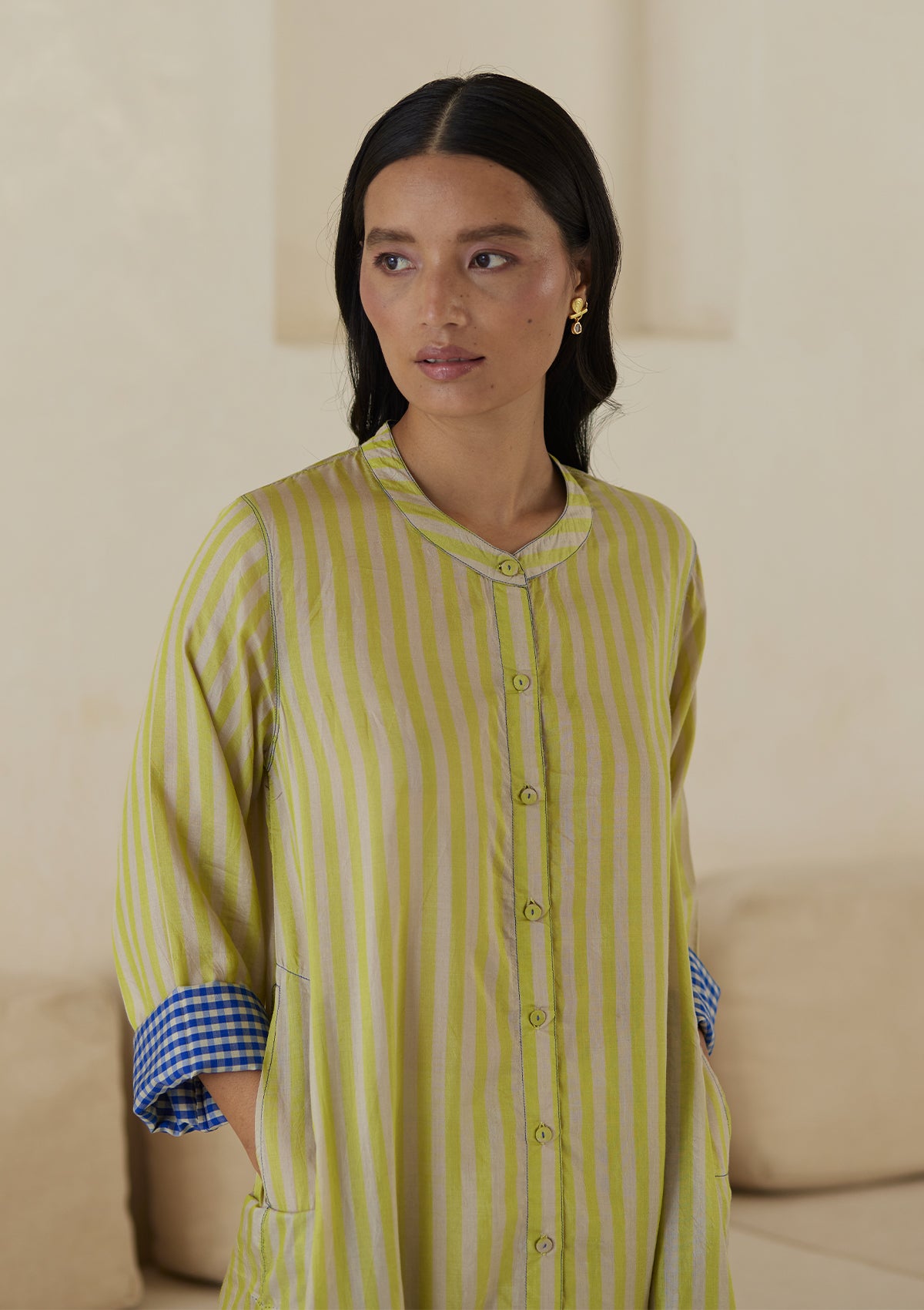 Kurta set for women, in lime stripes, from Surmaye. Made in handwoven silk modal with a relaxed silhouette. Vibrant contrast-blue checked fabric detailing.