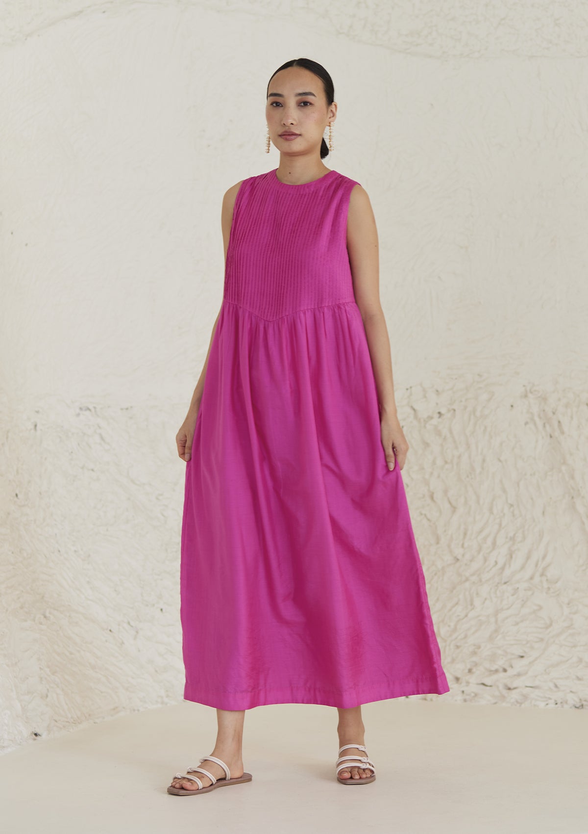 Pink silk dress from Surmaye, in handwoven silk modal. Exquisite pleat detailing on the front yoke.