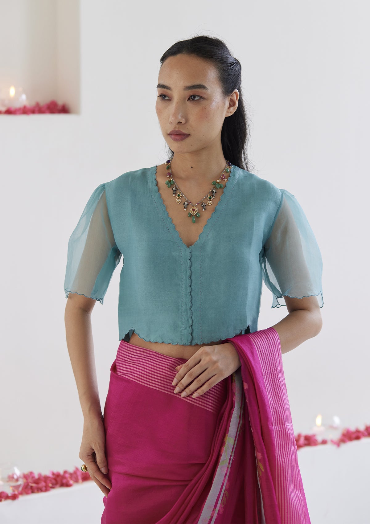 Blue designer blouse, crafted in handwoven organza silk, from Surmaye. Scalloped embroidery edges all over. Lined with handwoven mulberry silk.