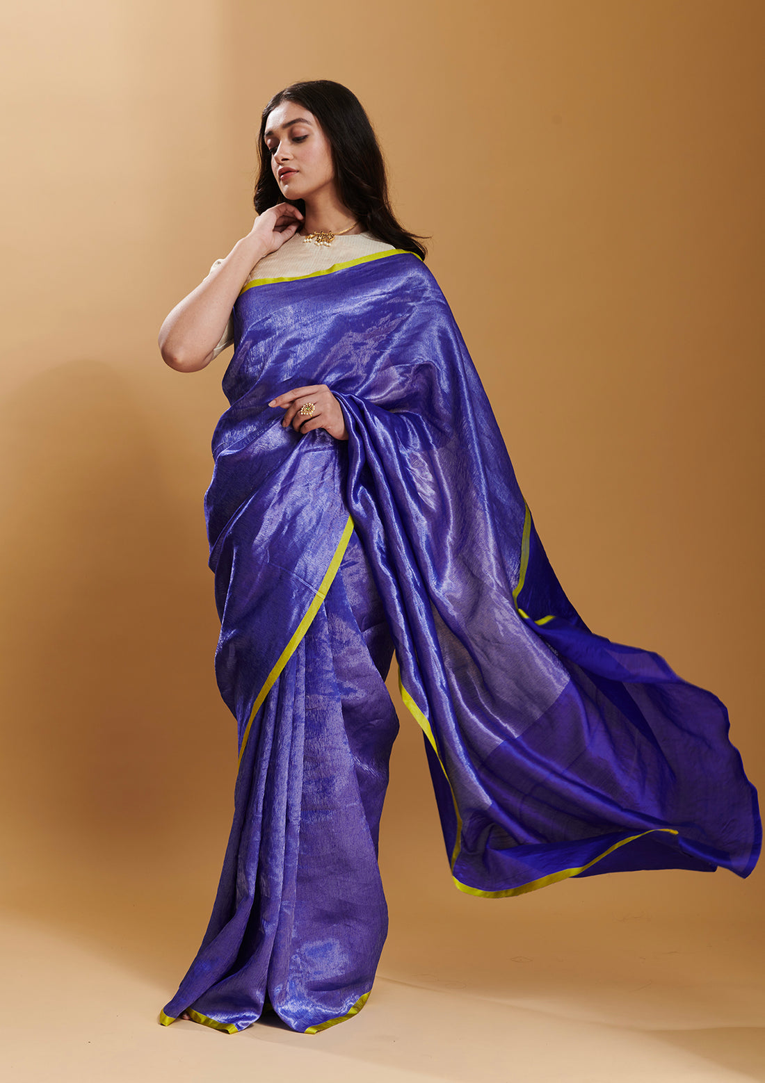 Blue handloom saree from Surmaye, made with handwoven mulberry silk zari. Contrasting yellow satin border. 