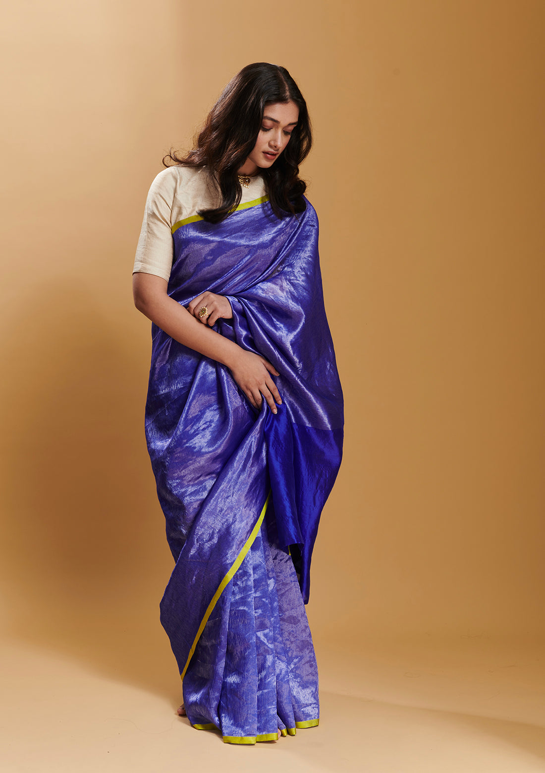 Blue handloom saree from Surmaye, made with handwoven mulberry silk zari. Contrasting yellow satin border. 