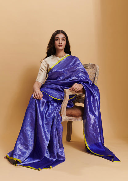 Blue handloom saree from Surmaye, made with handwoven mulberry silk zari. Contrasting yellow satin border. 