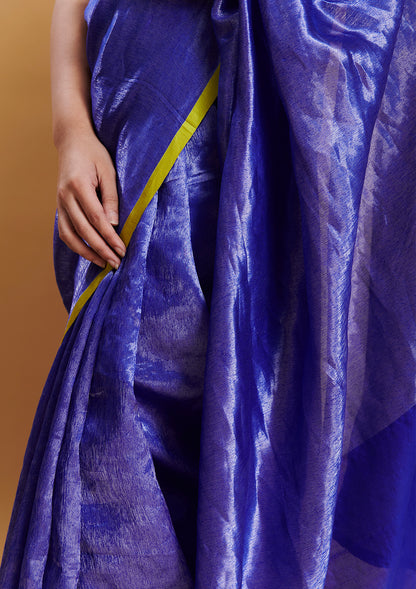 Blue handloom saree from Surmaye, made with handwoven mulberry silk zari. Contrasting yellow satin border. 