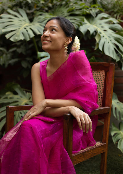 Jia Singh in a pink handloom silk organza jamdani saree, from Surmaye. Adorned with all-over jamdani weave dots. 