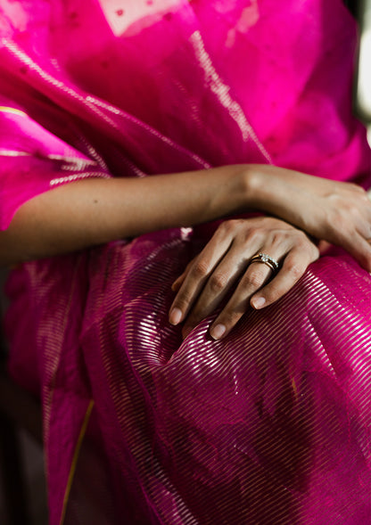 Pink handloom silk organza jamdani saree, from Surmaye. Adorned with all-over jamdani weave dots. 